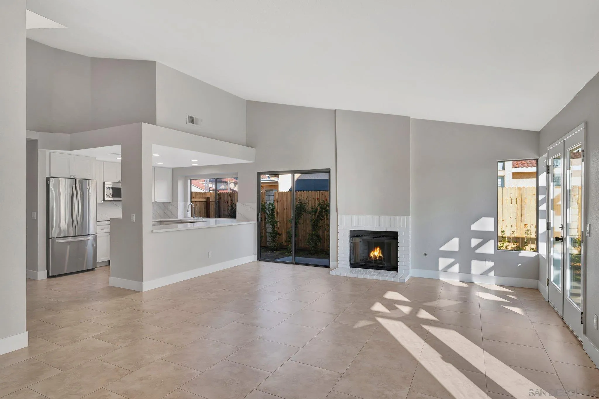 365 Apollo Drive Vista, CA 92084 - Photo 10 of 35 a living room with furniture and a fireplace