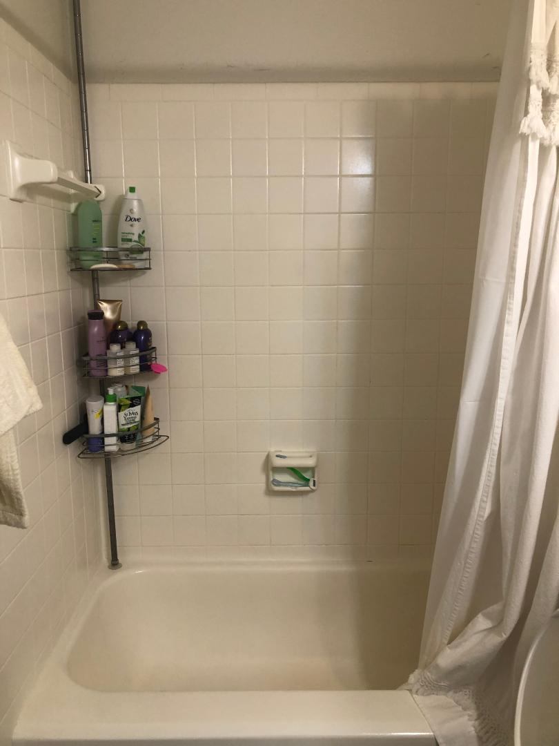 1915 Fairlawn Lane, Unit 2 Austin, TX 78704 - Photo 11 of 12 Full bathroom featuring shower / bath combination with curtain