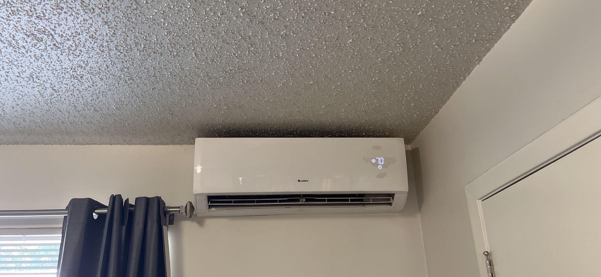 1915 Fairlawn Lane, Unit 2 Austin, TX 78704 - Photo 12 of 12 Detailed view of a mini split for heating / cooling and a textured ceiling