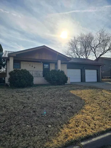 a house view with a backyard space