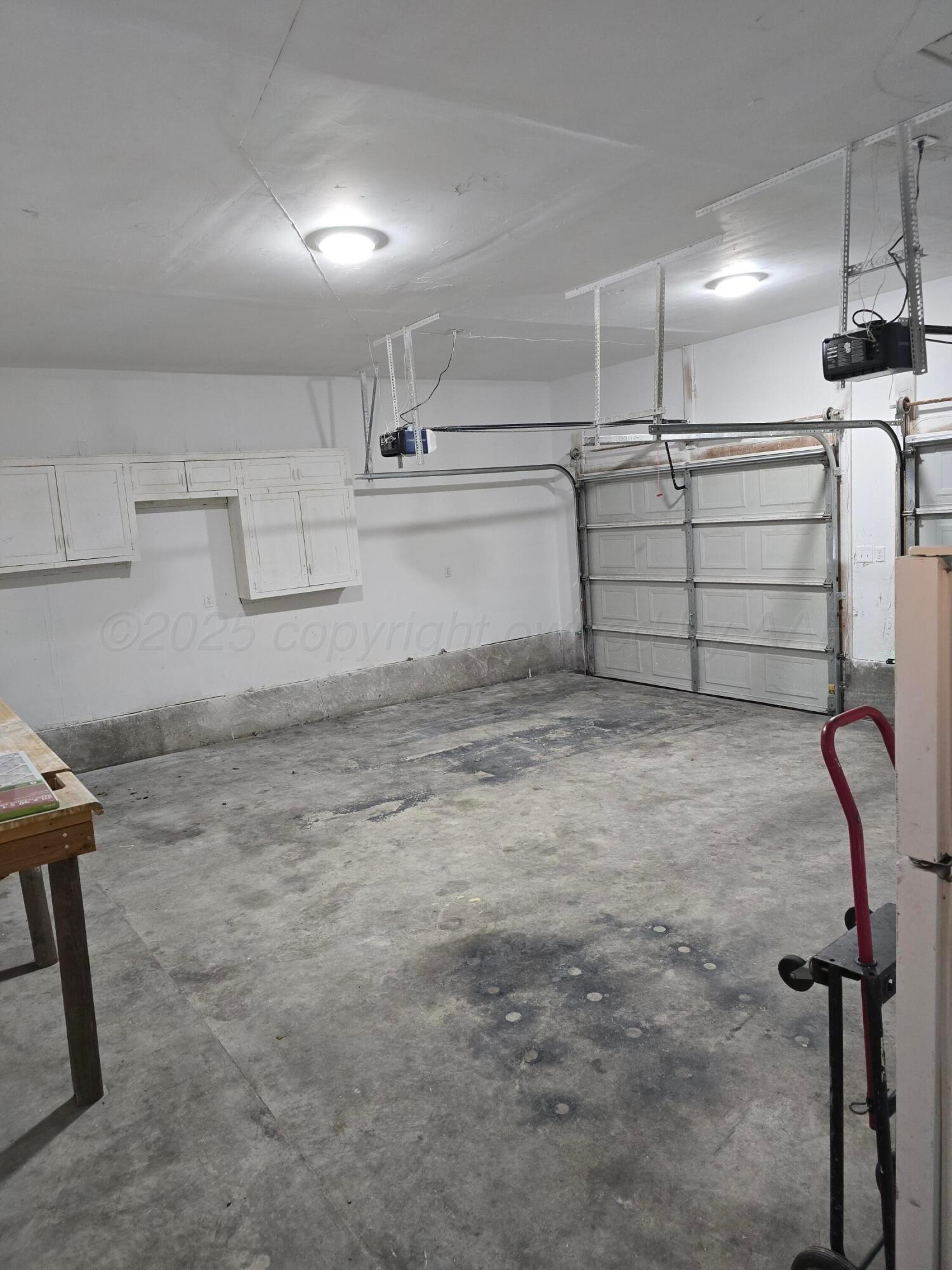 129 Pecan Street Borger, TX 79007 - Photo 22 of 23 a view of a room with racks on the wall