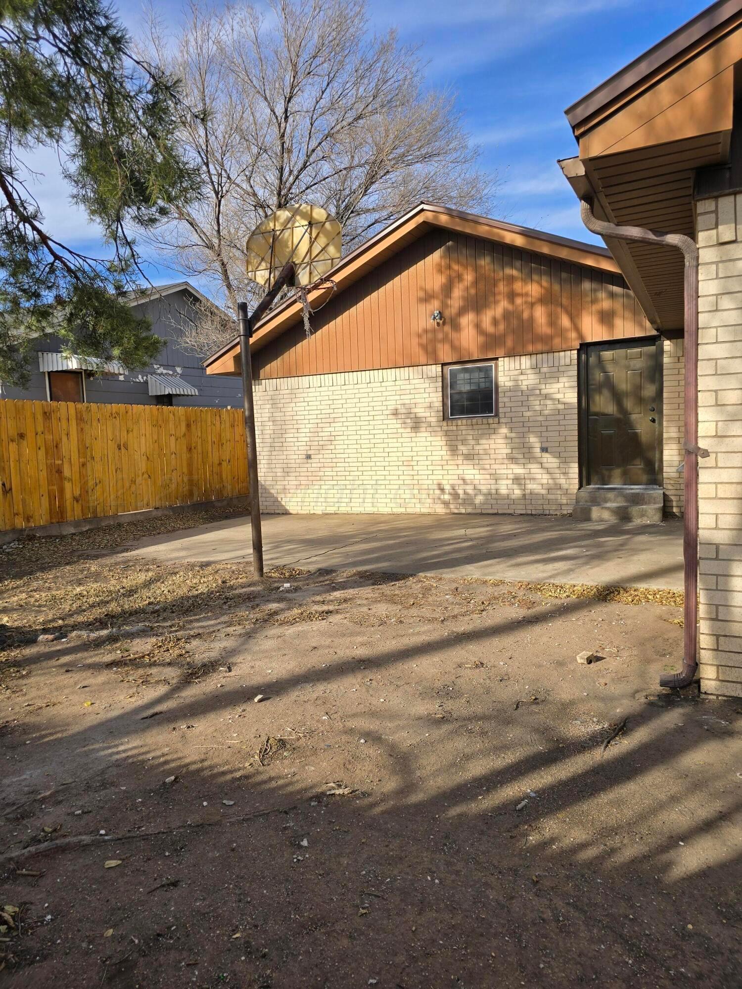 129 Pecan Street Borger, TX 79007 - Photo 5 of 23 a view of a backyard of a house