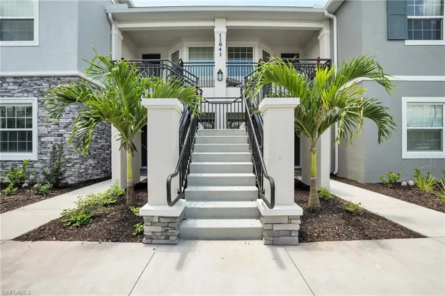 a view of two chairs in patio