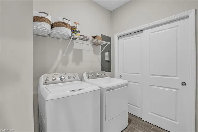 a utility room with dryer and washer