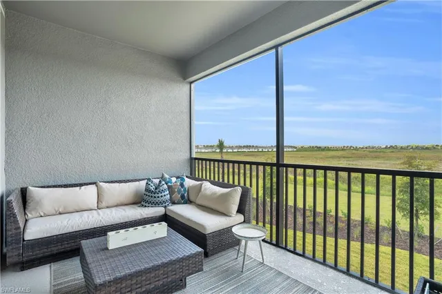 a balcony with furniture