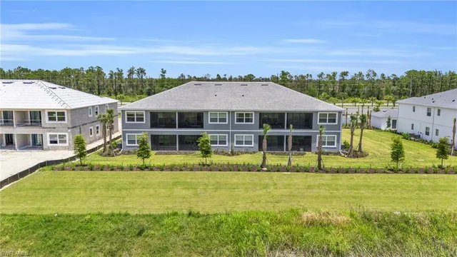 a house with swimming pool in front of it