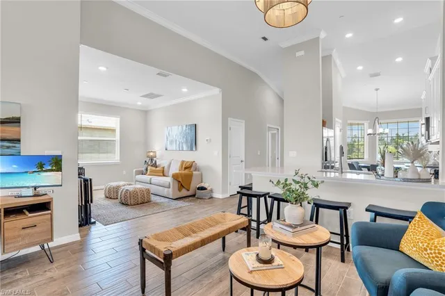 a room with furniture and a wooden floor