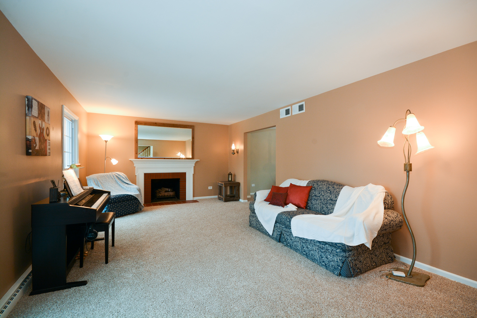 26W564 Jewell Road Winfield, IL 60190 - Photo 2 of 40 a living room with furniture and a fireplace