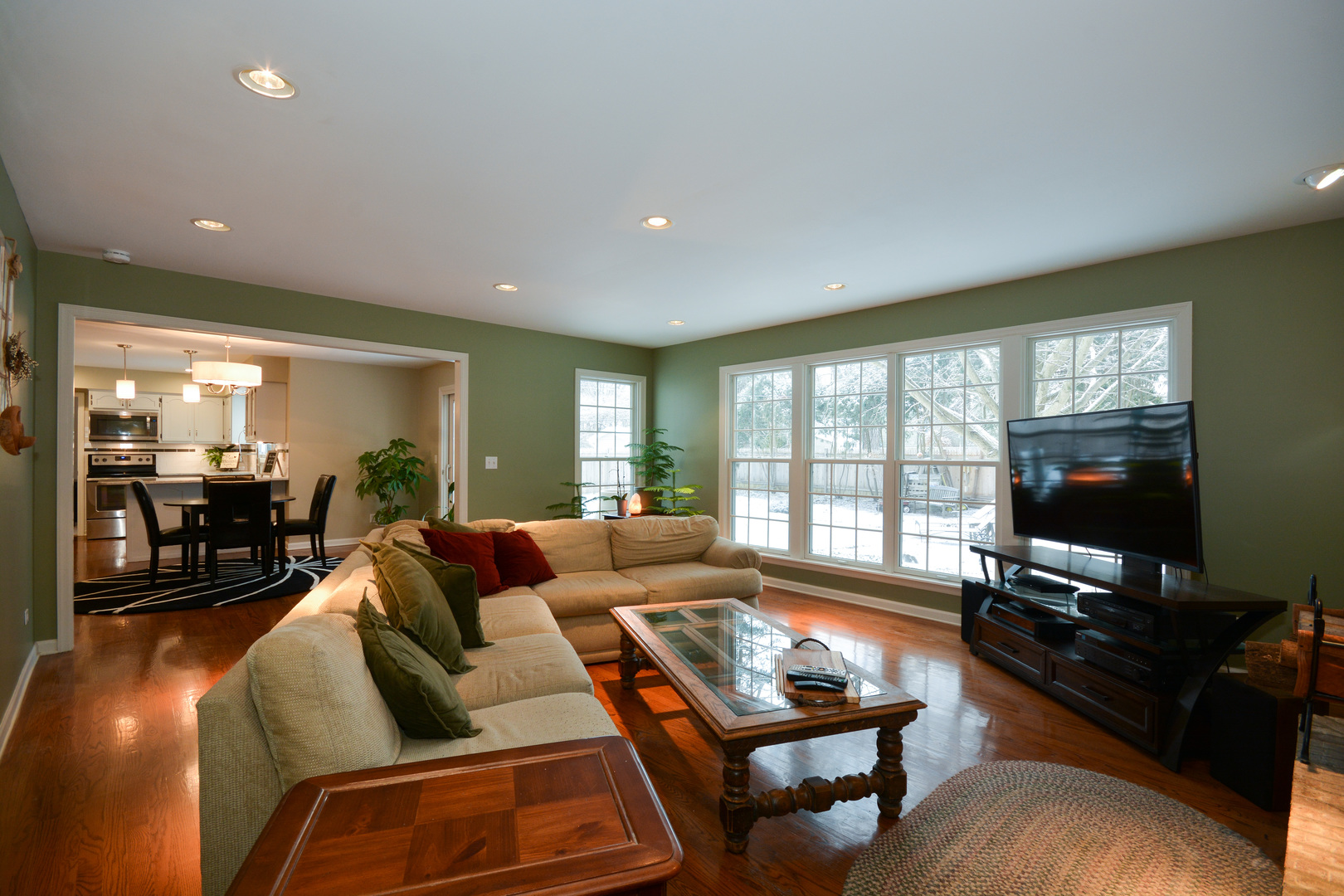 26W564 Jewell Road Winfield, IL 60190 - Photo 11 of 40 a living room with furniture and a flat screen tv