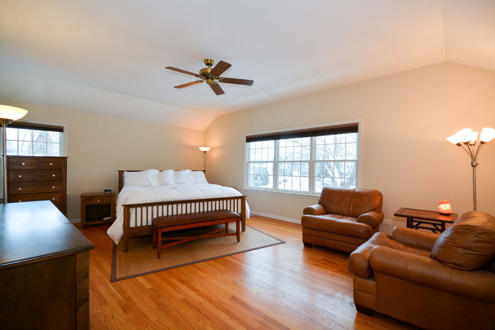 26W564 Jewell Road Winfield, IL 60190 - Photo 15 of 40 a living room with furniture a ceiling fan and a window