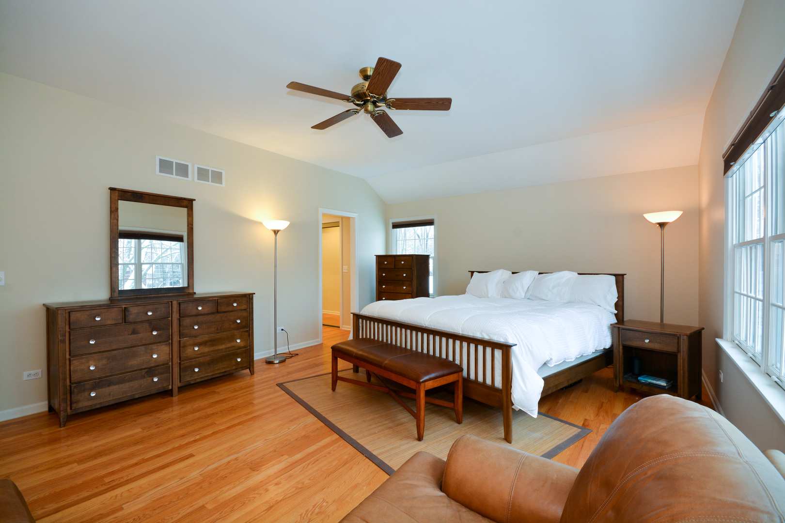26W564 Jewell Road Winfield, IL 60190 - Photo 16 of 40 a bedroom with a bed and a dresser