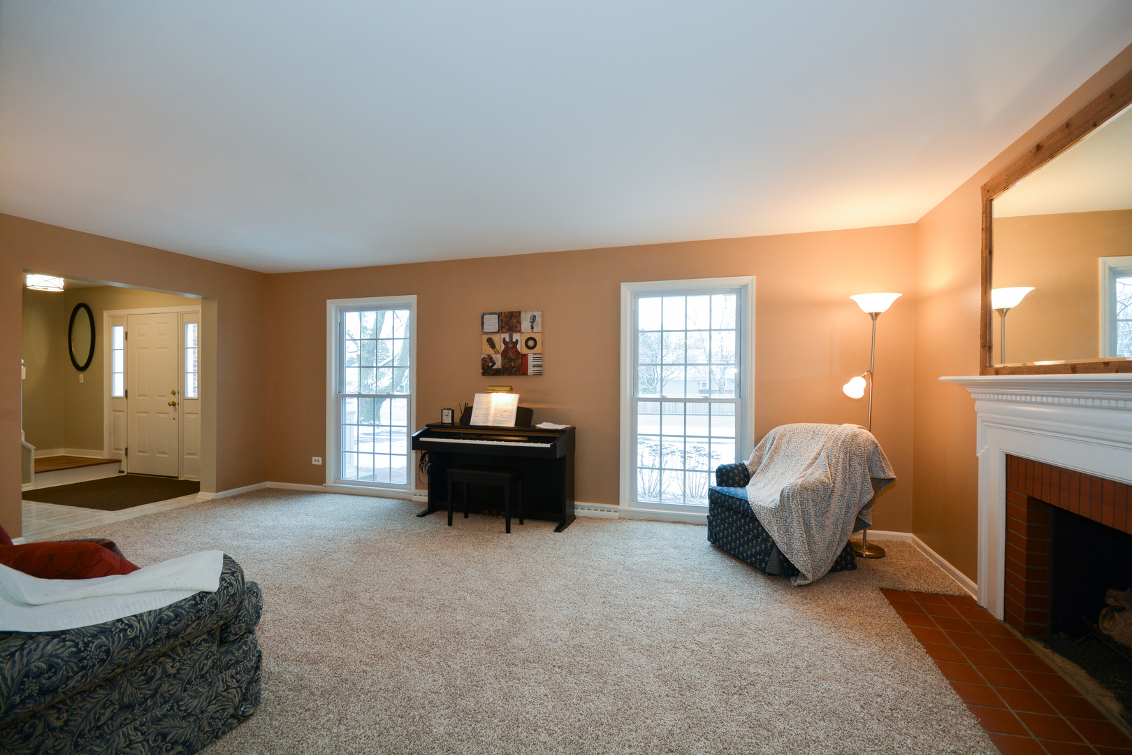 26W564 Jewell Road Winfield, IL 60190 - Photo 3 of 40 a living room with furniture and a fireplace