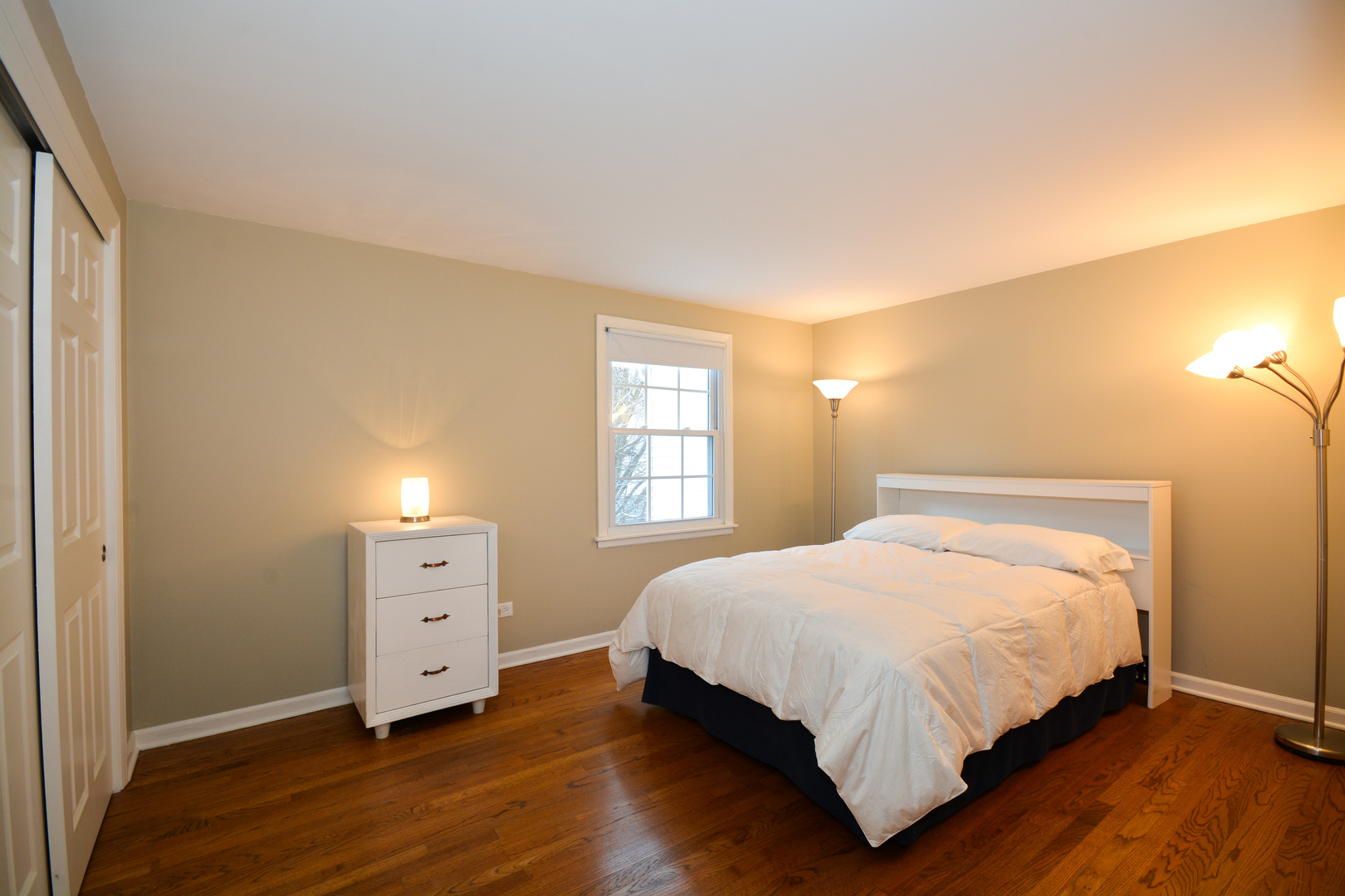 26W564 Jewell Road Winfield, IL 60190 - Photo 23 of 40 a bedroom with a bed and window