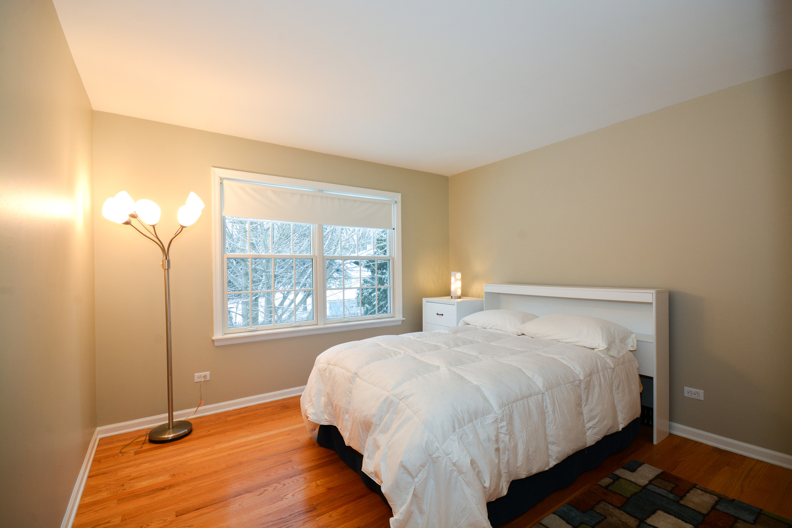 26W564 Jewell Road Winfield, IL 60190 - Photo 24 of 40 a bedroom with a bed and a window