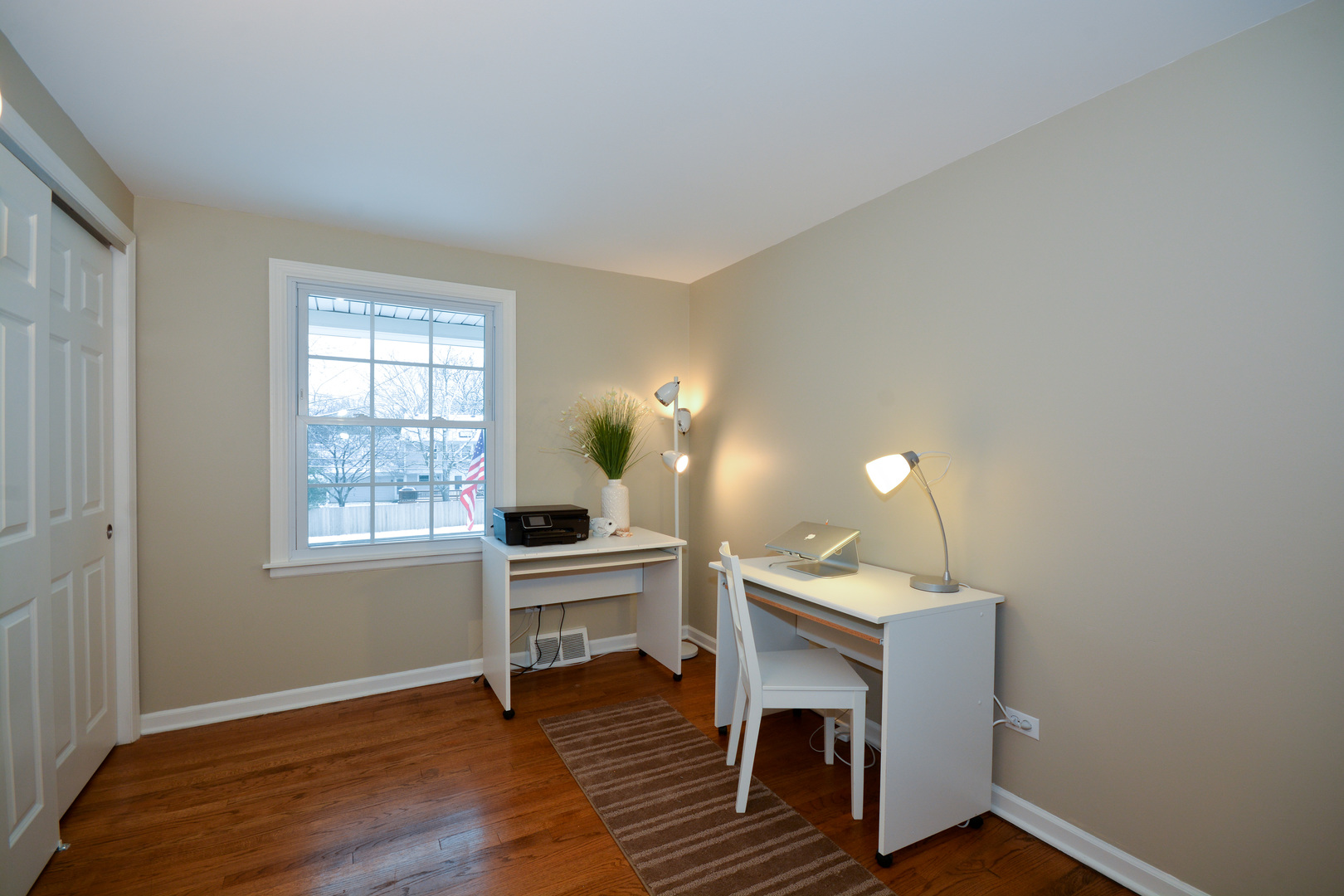26W564 Jewell Road Winfield, IL 60190 - Photo 26 of 40 a room with furniture and a wooden floor