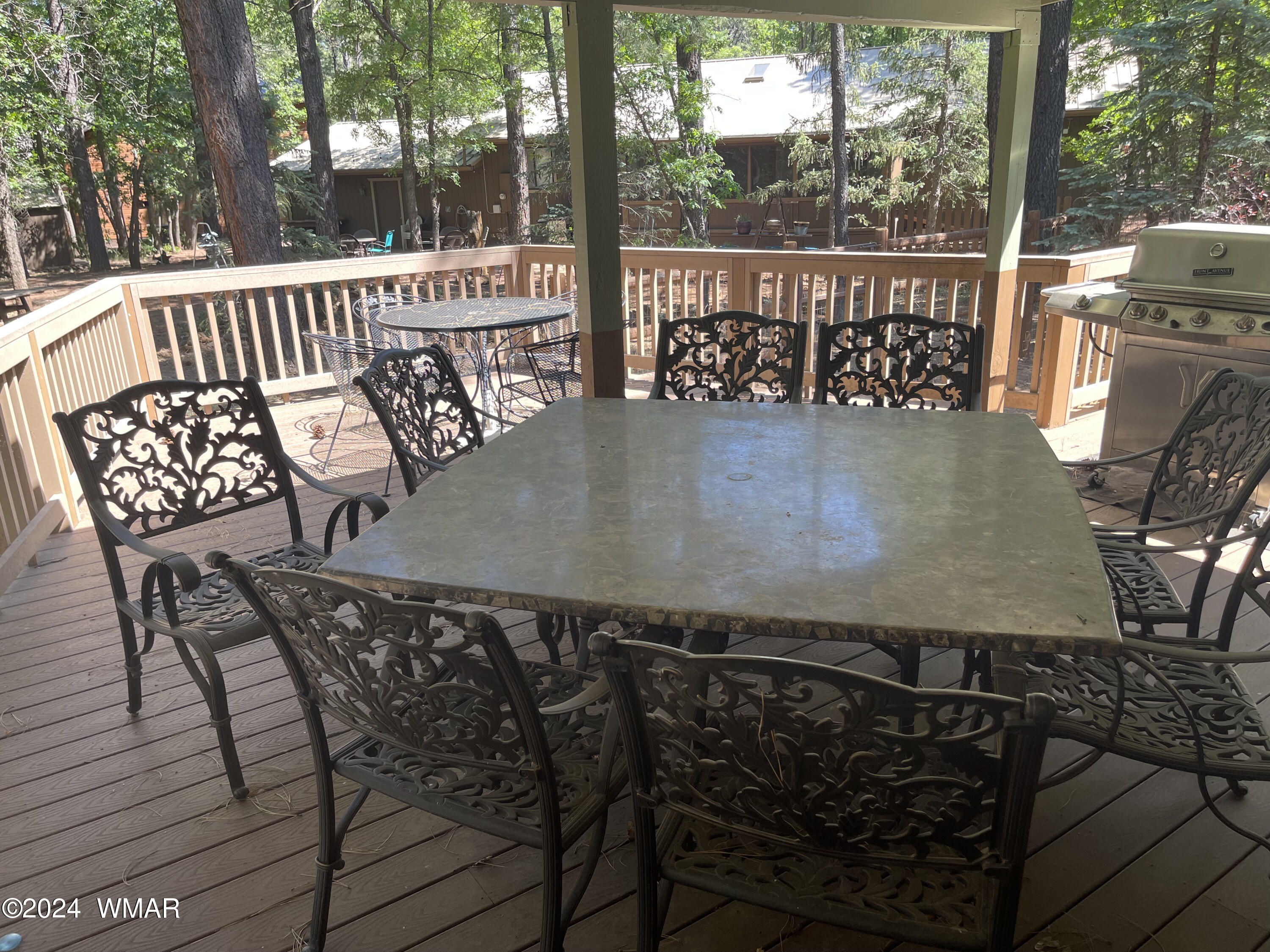 3933 Snow Circle Pinetop, AZ 85935 - Photo 25 of 25 Rear patio with extra large table.