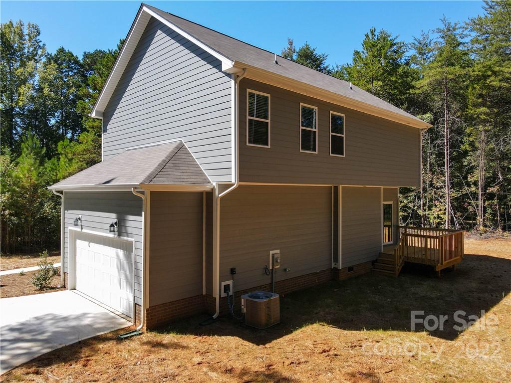 4960 Long Ferry Road Salisbury, NC 28146 - Photo 12 of 14 a view of a house with a yard