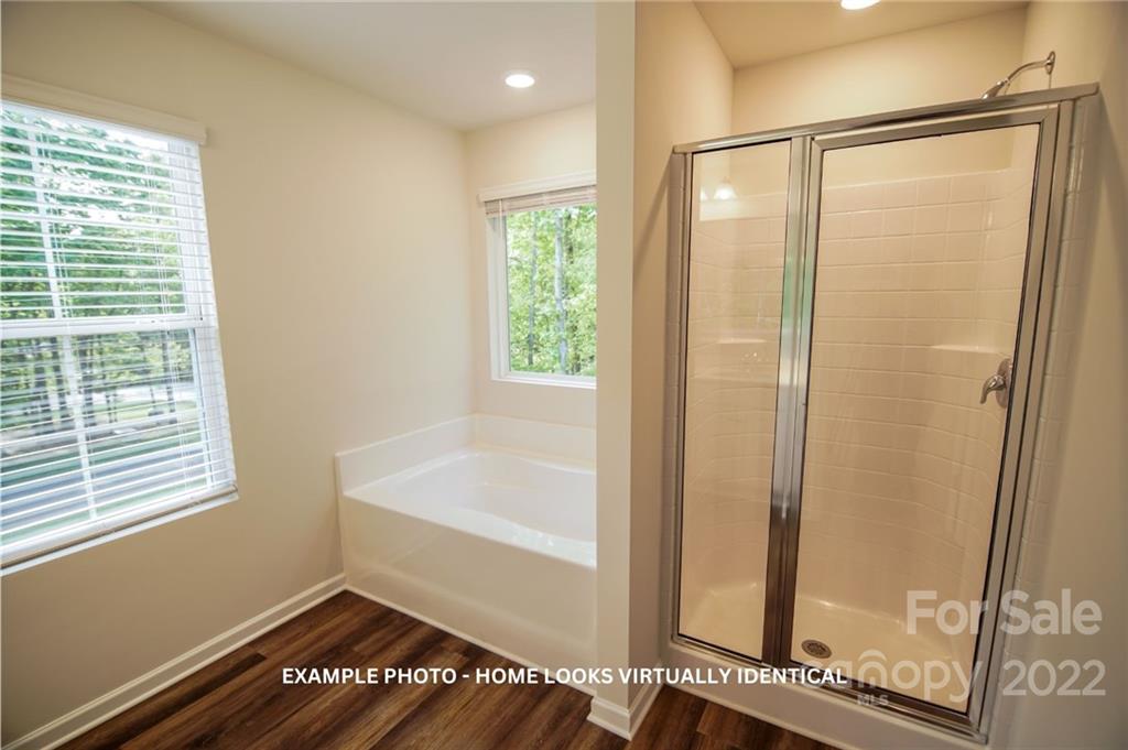 4960 Long Ferry Road Salisbury, NC 28146 - Photo 8 of 14 a bathroom with a bathtub and a shower