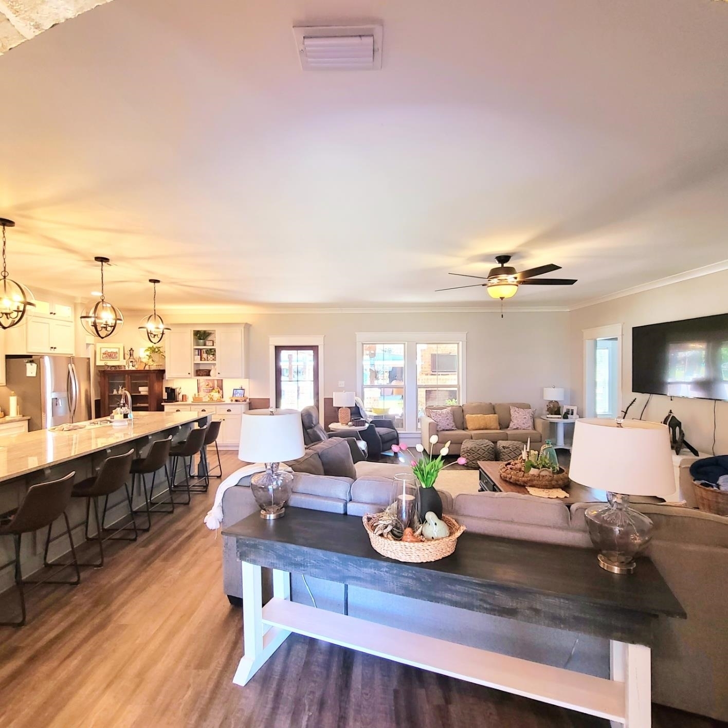 10051 Blackwell Nursery Road Semmes, AL 36575 - Photo 37 of 54 Living room featuring dark wood-style floors and a ceiling fan