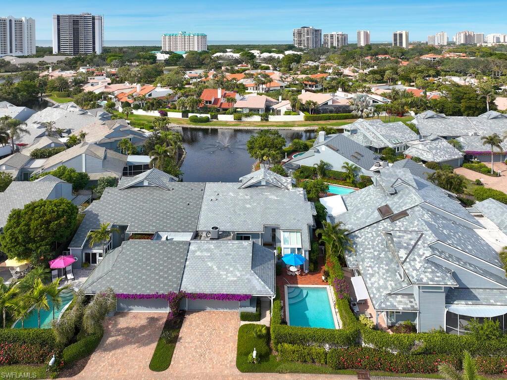 655 Bridgeway Lane Naples, FL 34108 - Photo 3 of 3 an aerial view of a houses with yard