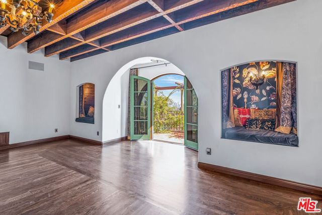a bathroom with a shower and a sink