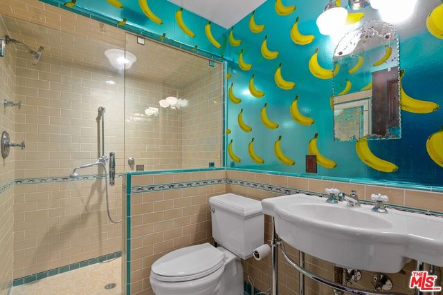 a view of a swimming pool with an outdoor space and seating area