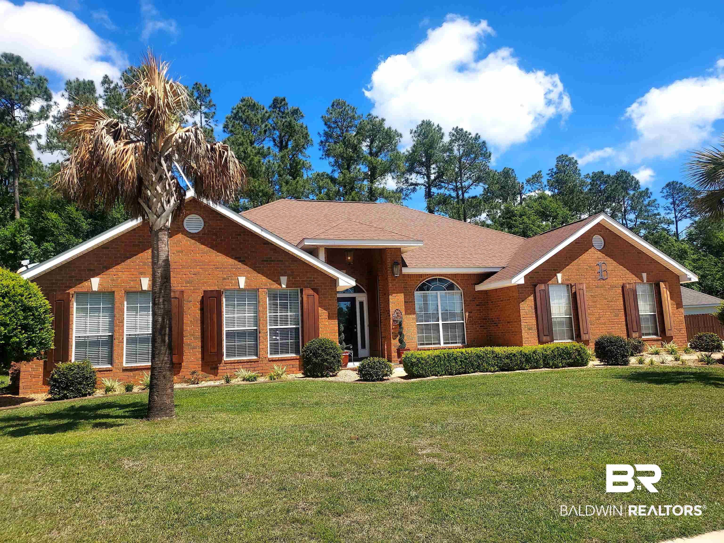 373 Collinwood Loop Foley, AL 36535 - Photo 1 of 49 Single story home with brick siding, a front lawn, and a shingled roof