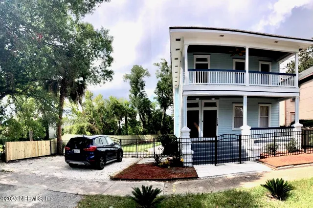 a car parked in front of a house