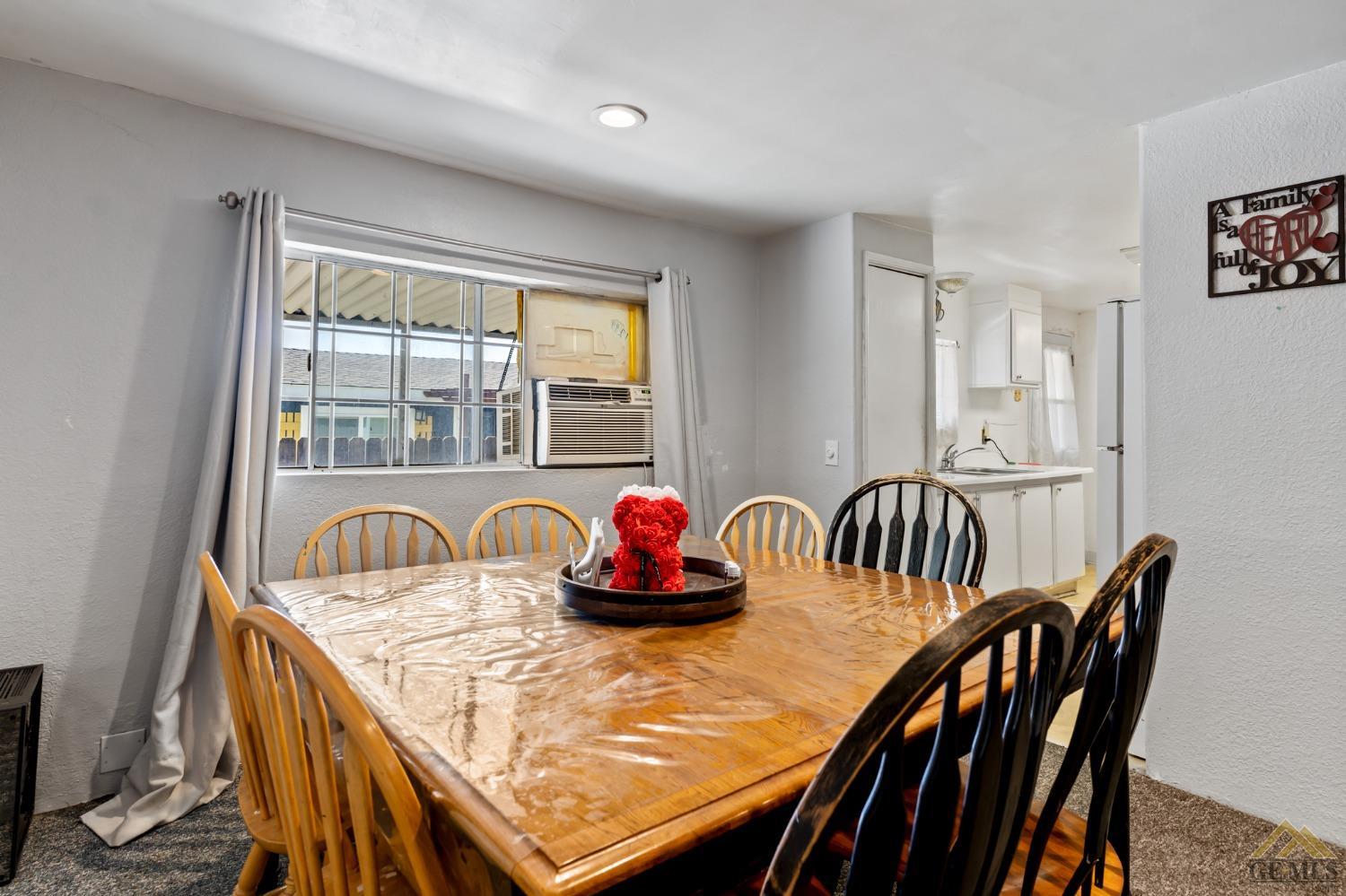 Undisclosed Address Bakersfield, CA 93306 - Photo 15 of 28 a dining room with furniture and window