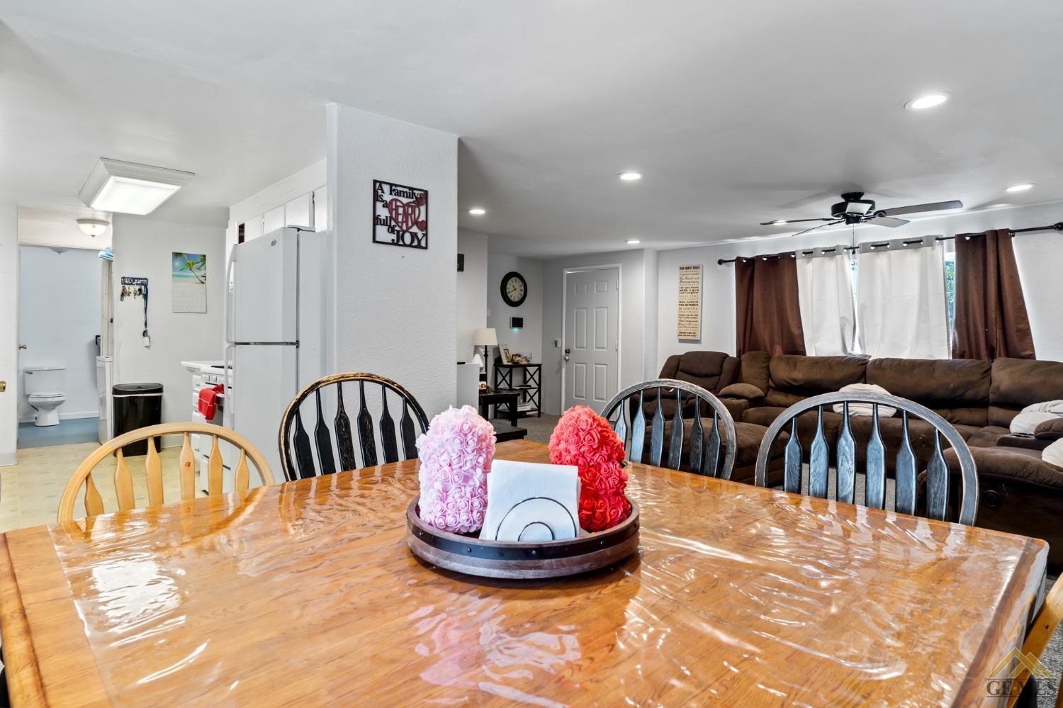 Undisclosed Address Bakersfield, CA 93306 - Photo 16 of 28 a view of a dining room with furniture
