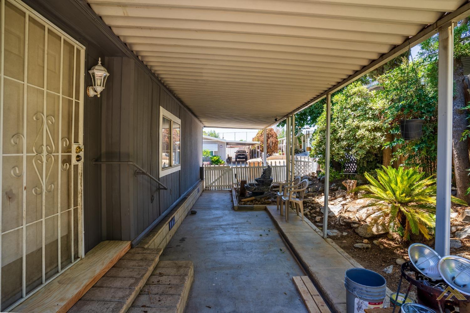 Undisclosed Address Bakersfield, CA 93306 - Photo 5 of 28 a outdoor space with lots of potted plants