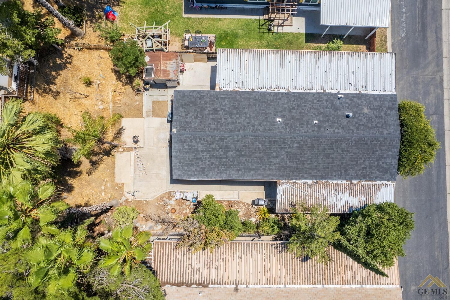 Undisclosed Address Bakersfield, CA 93306 - Photo 9 of 28 front view of a house with a yard