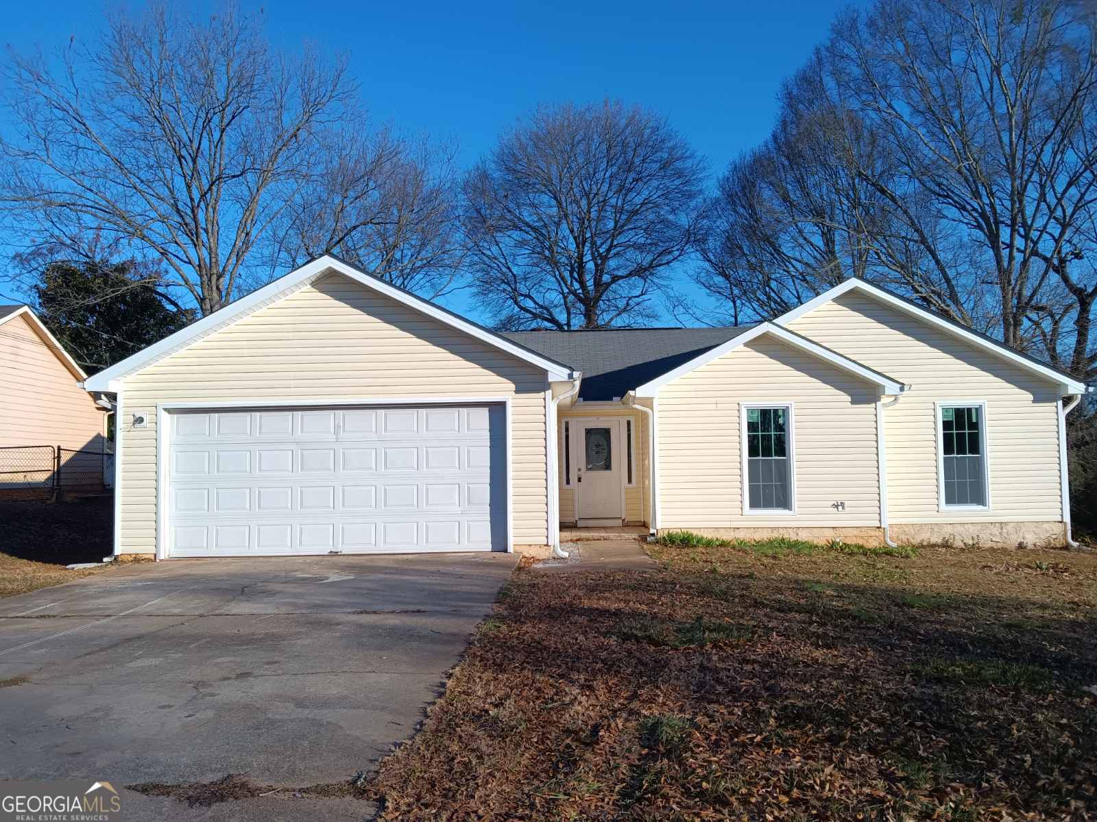 3668 Paddington Trail Rex, GA 30273 - Photo 11 of 21 a front view of a house with a yard and garage