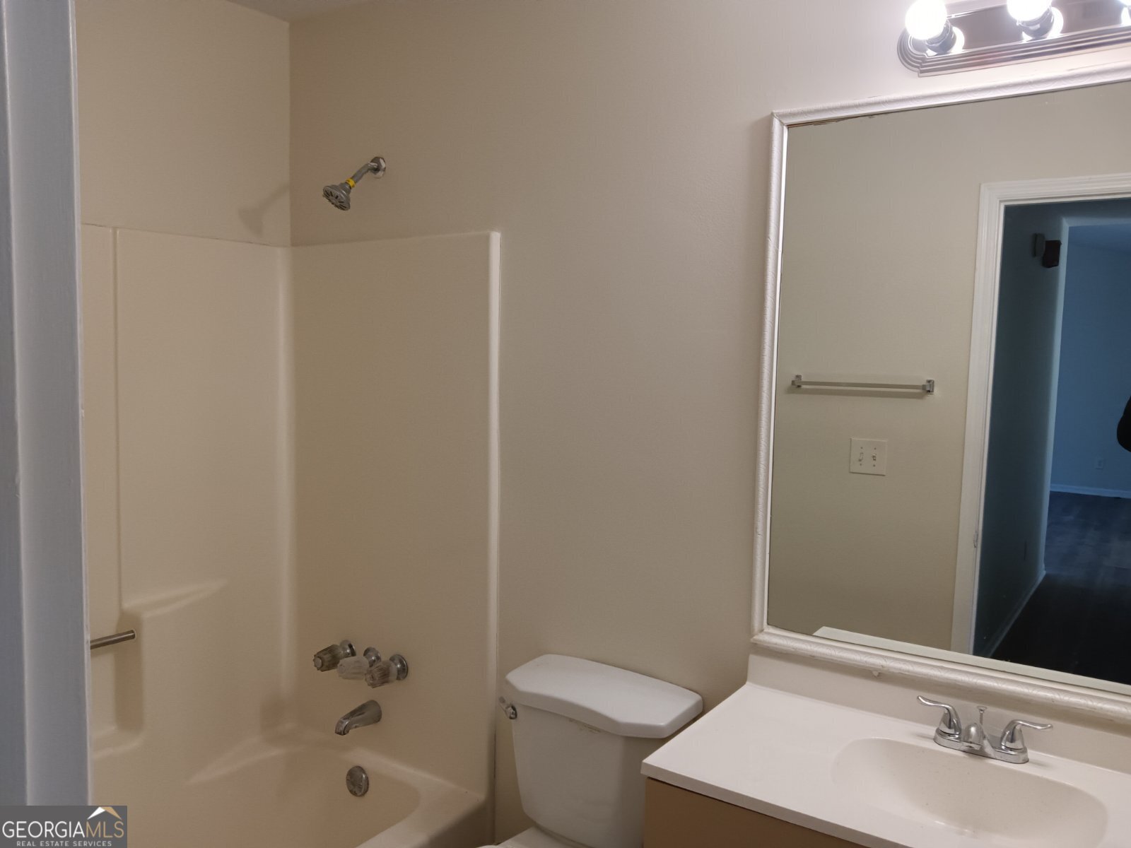 3668 Paddington Trail Rex, GA 30273 - Photo 16 of 21 a bathroom with a sink a toilet and shower