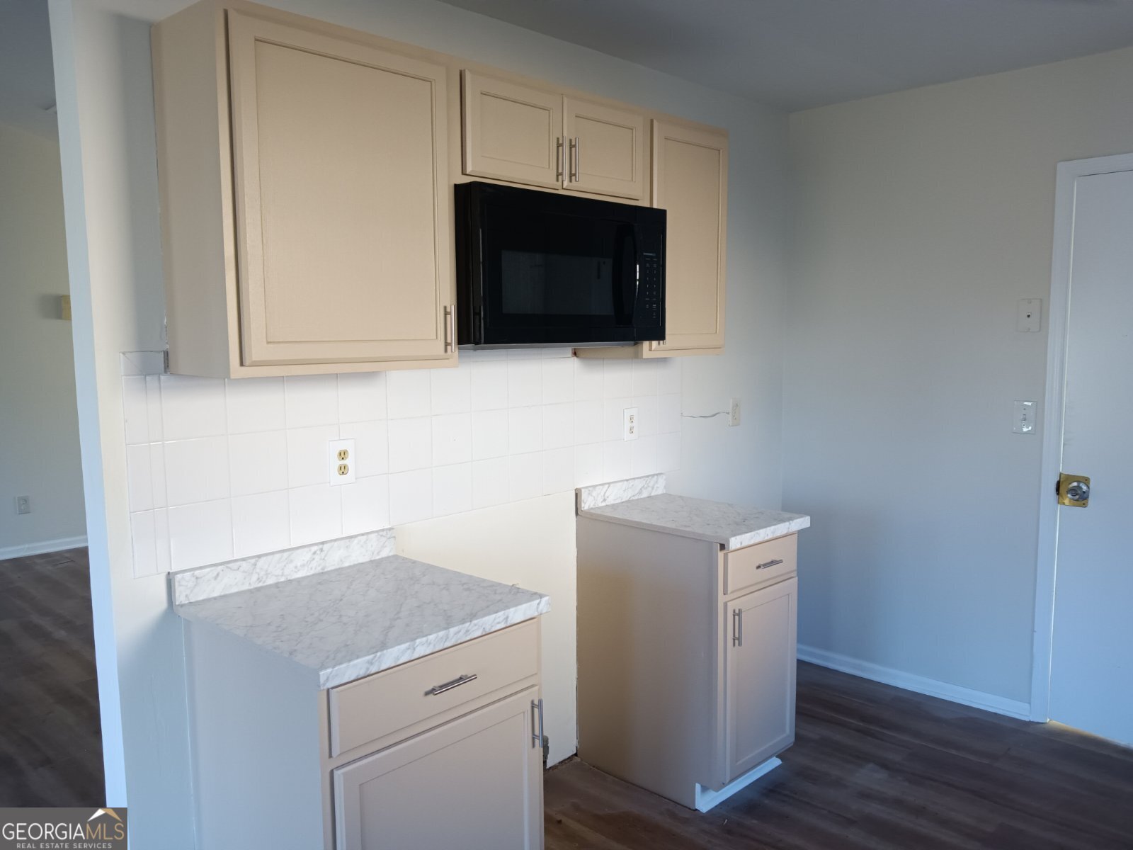 3668 Paddington Trail Rex, GA 30273 - Photo 21 of 21 a view of cabinets and wooden floor