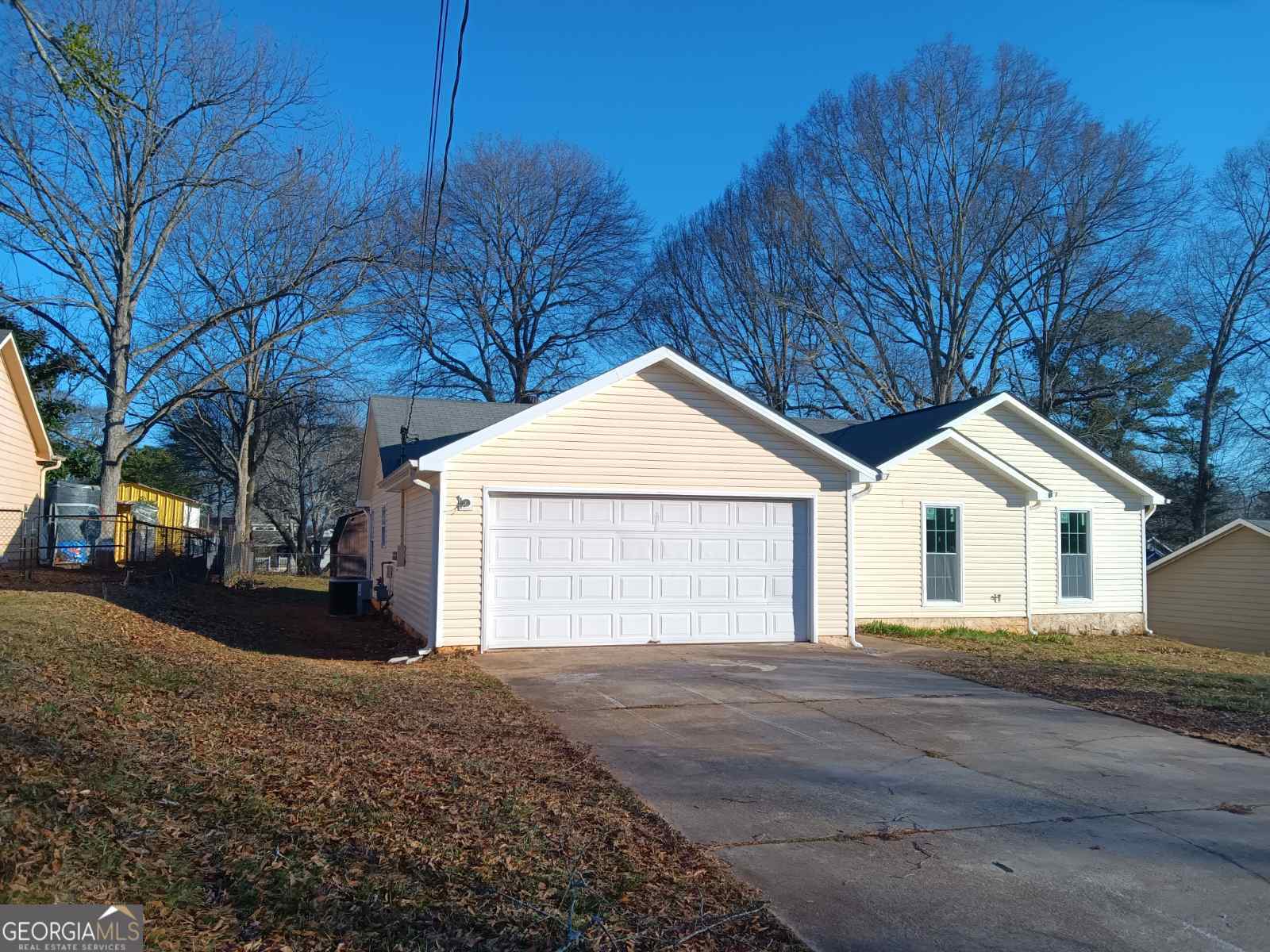 3668 Paddington Trail Rex, GA 30273 - Photo 10 of 21 a front view of a house with a yard and garage