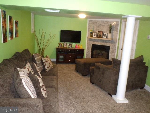 810 Beards Hill Road Aberdeen, MD 21001 - Photo 12 of 13 FINISHED REC ROOM W/ GAS FIREPLACE IN LOWER LEVEL