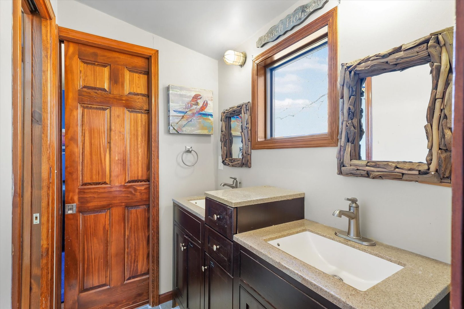 12 Turtle Creek Road Monticello, IL 61856 - Photo 33 of 63 a bathroom with a sink a mirror and a window