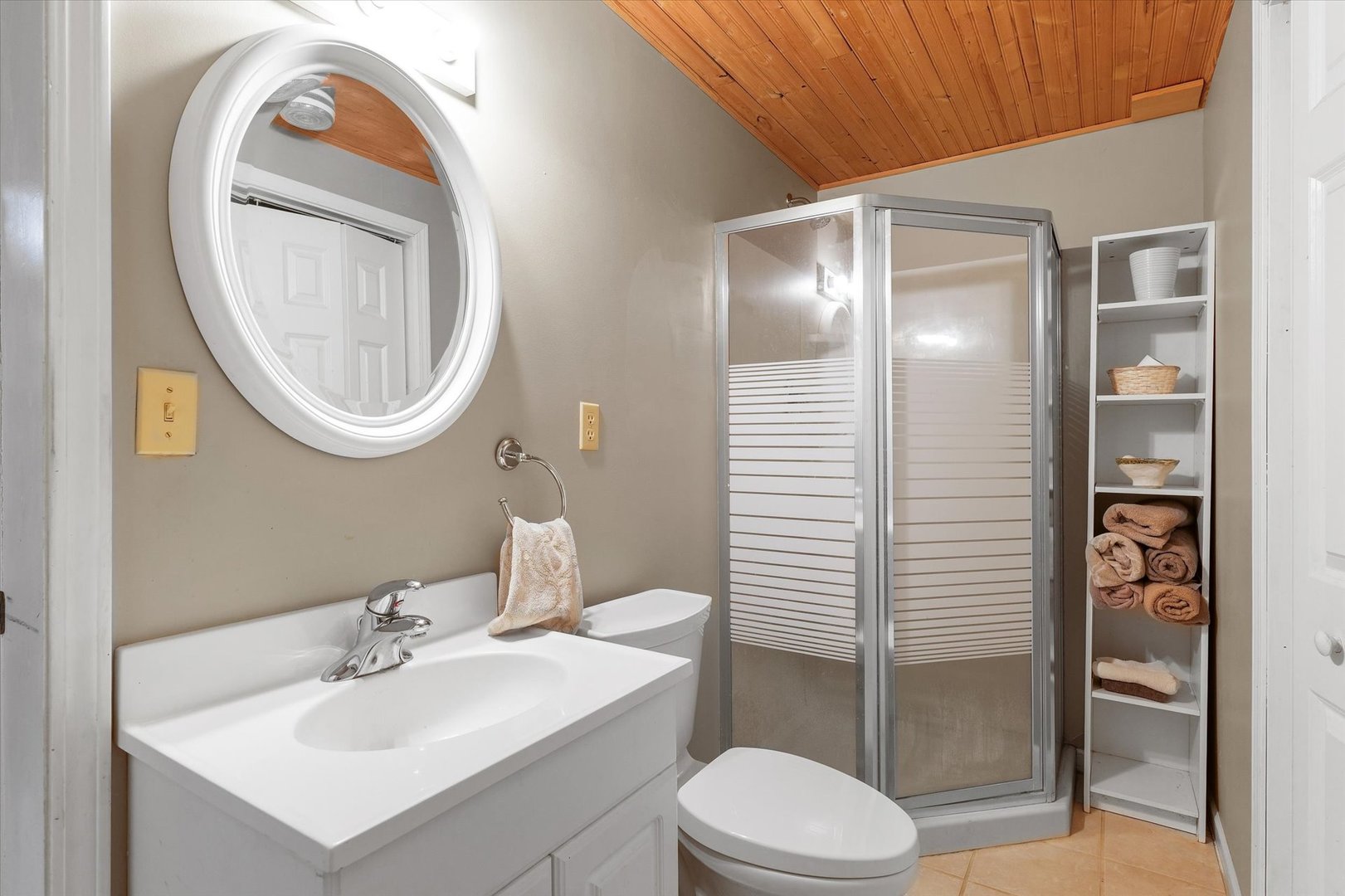 12 Turtle Creek Road Monticello, IL 61856 - Photo 48 of 63 a bathroom with a toilet sink vanity and mirror