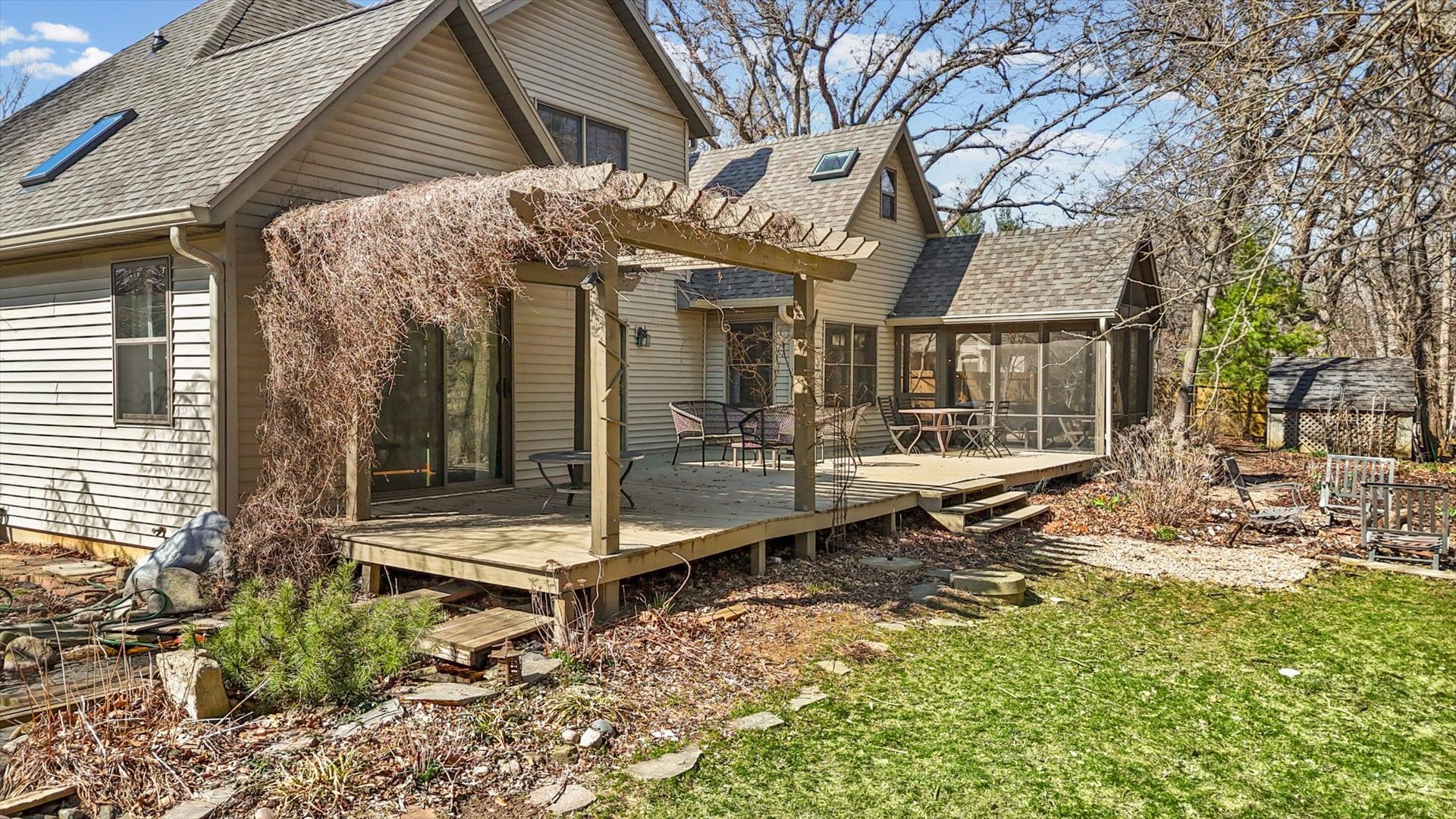 12 Turtle Creek Road Monticello, IL 61856 - Photo 55 of 63 a backyard of a house with barbeque oven table and chairs