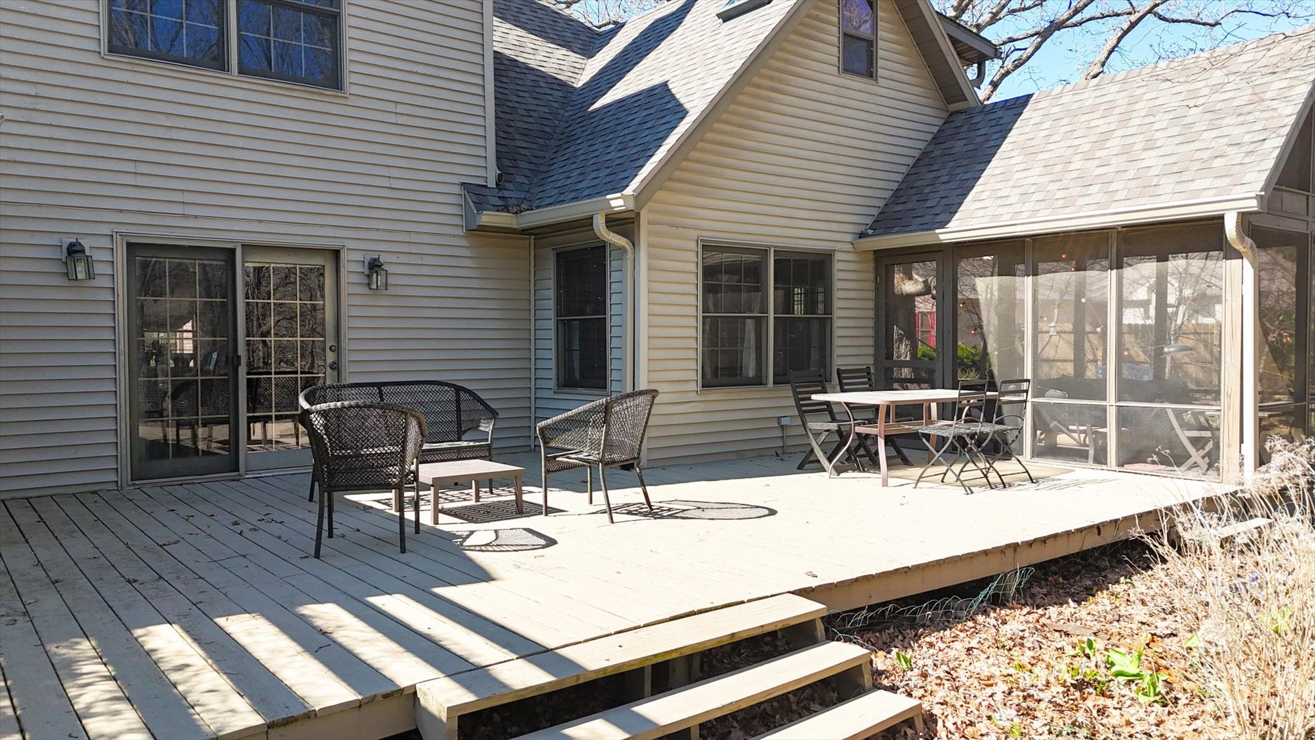 12 Turtle Creek Road Monticello, IL 61856 - Photo 56 of 63 a view of a patio with table and chairs with wooden floor and fence