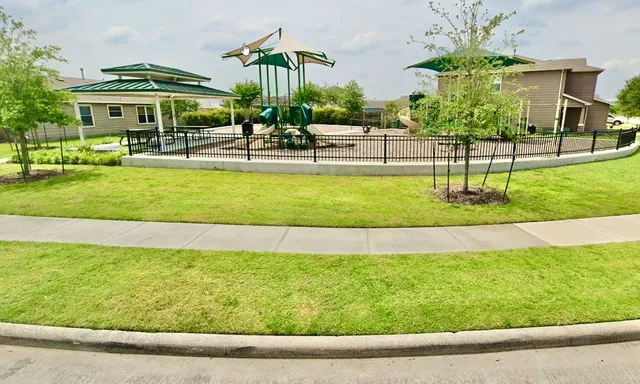 a view of a house with a swimming pool