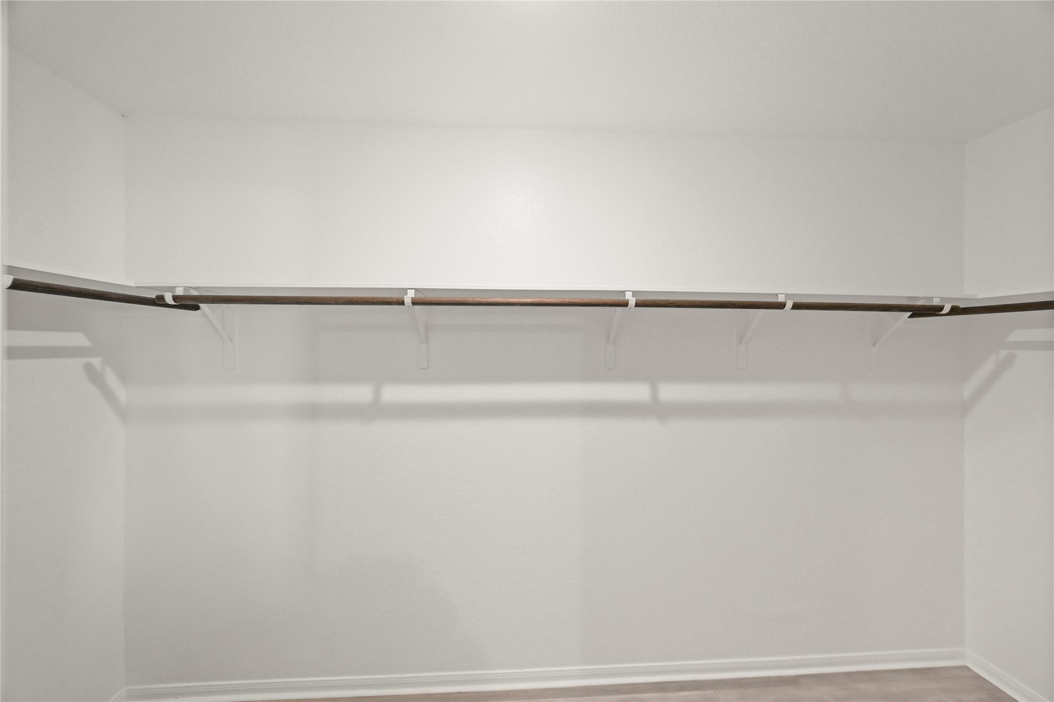 23442 Wrexham Street Spring, TX 77373 - Photo 13 of 33 a view of small space with racks on the wall