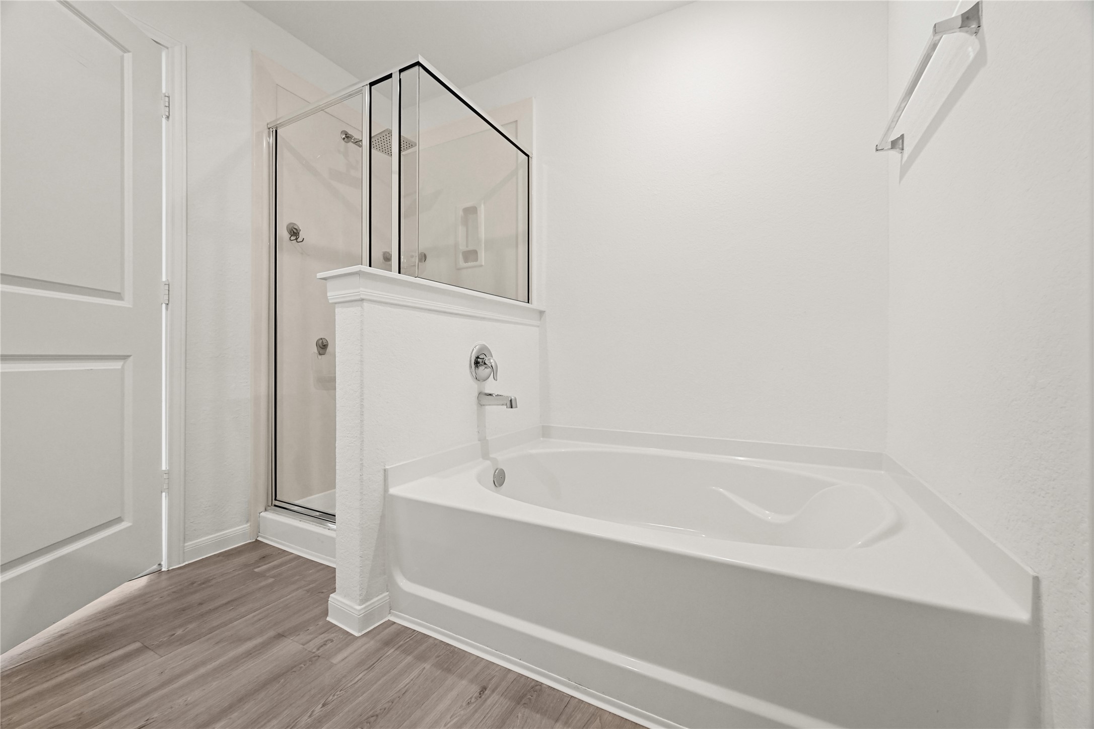 23442 Wrexham Street Spring, TX 77373 - Photo 15 of 33 a bathroom with a bathtub and a shower