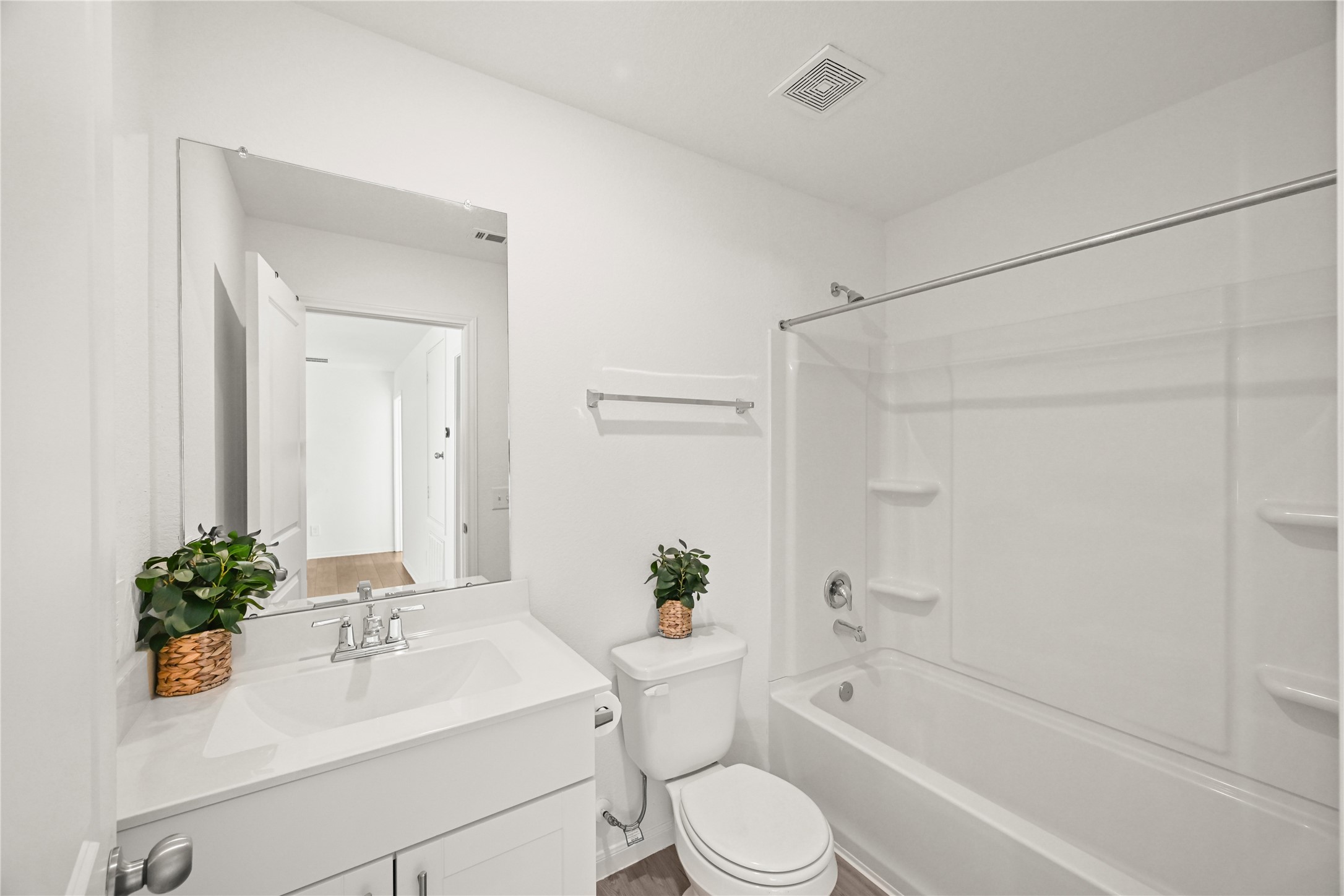 23442 Wrexham Street Spring, TX 77373 - Photo 19 of 33 a bathroom with a sink a toilet a tub and shower
