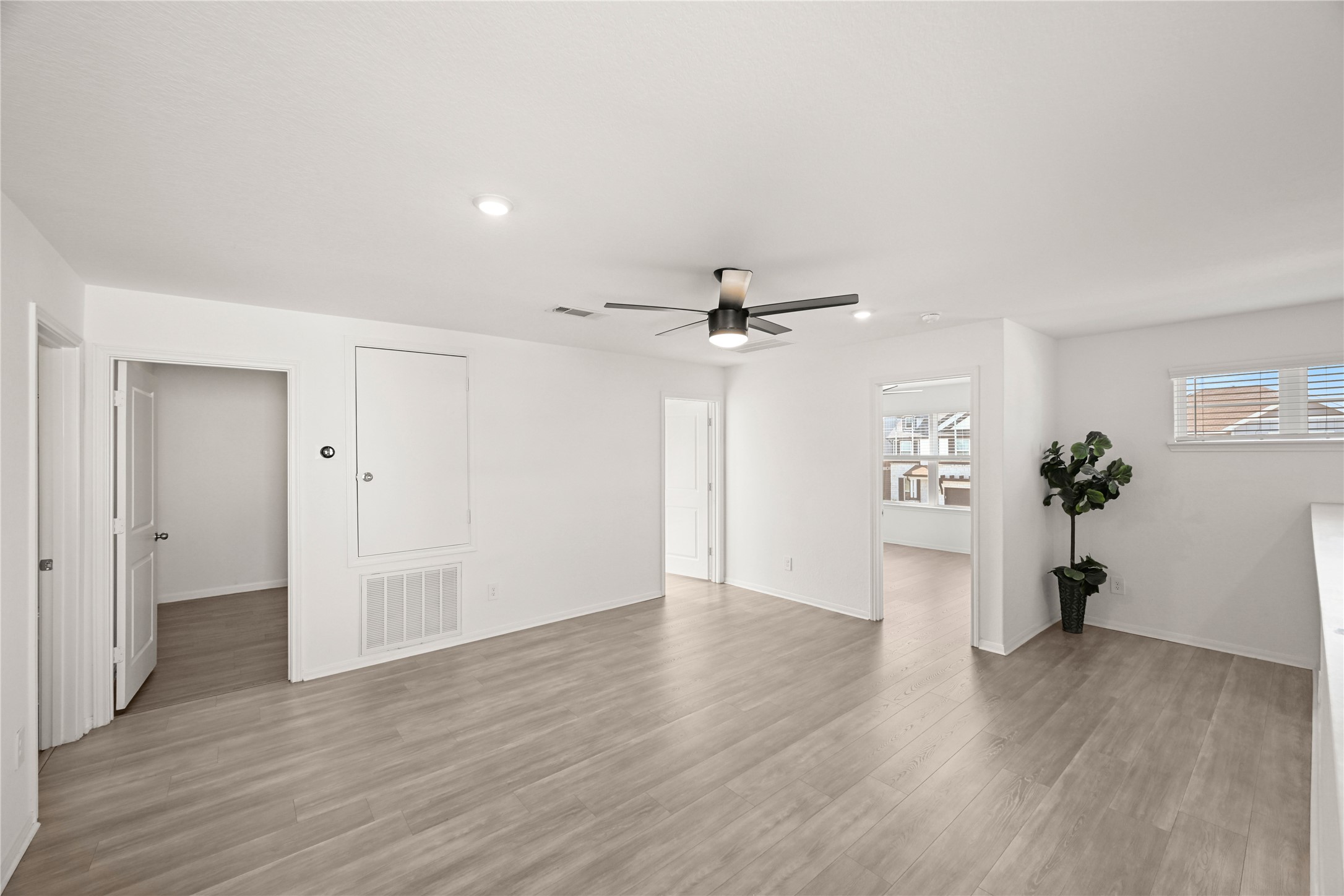 23442 Wrexham Street Spring, TX 77373 - Photo 24 of 33 wooden floor in an empty room with a window