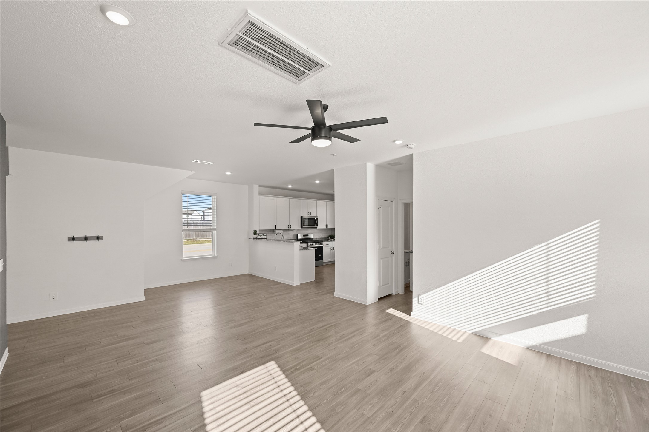 23442 Wrexham Street Spring, TX 77373 - Photo 6 of 33 a view of an empty room with a window