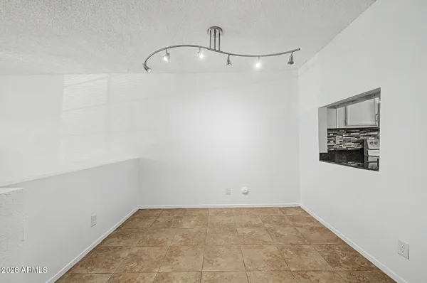 a view of a room with an empty space