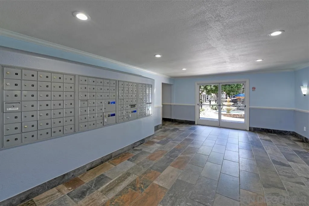 4860 Rolando Court, Unit 20 San Diego, CA 92115 - Photo 21 of 23 a view of a hallway