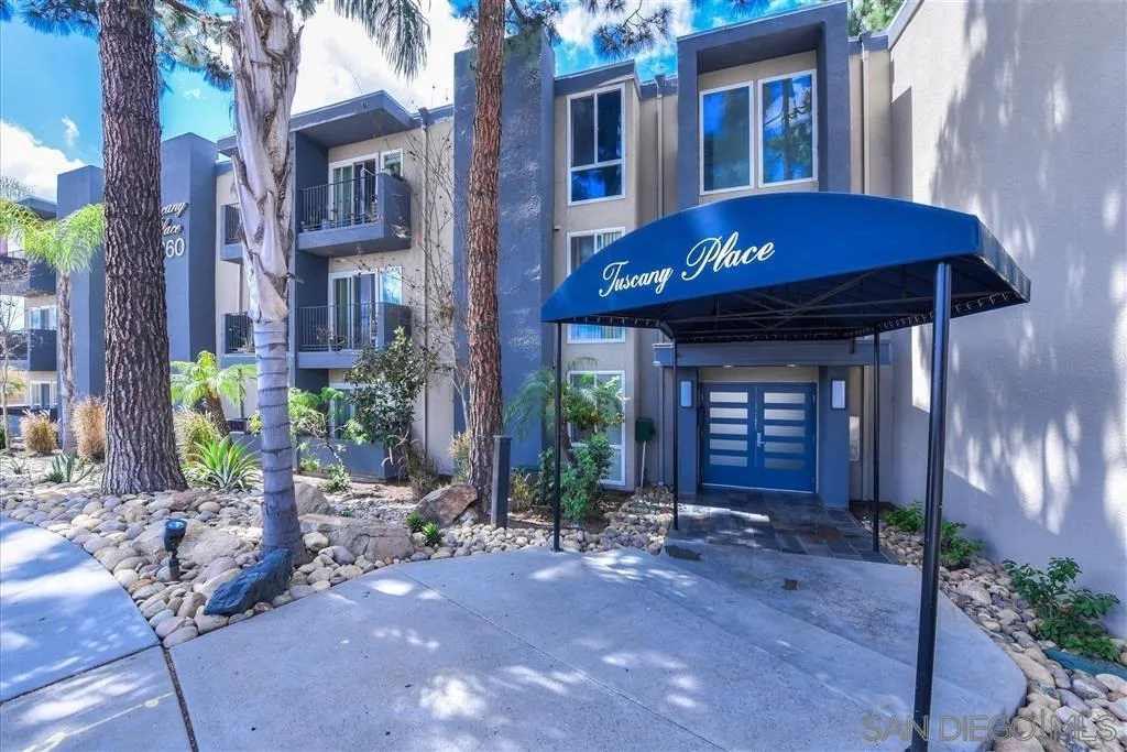 4860 Rolando Court, Unit 20 San Diego, CA 92115 - Photo 23 of 23 a view of a brick building with many windows